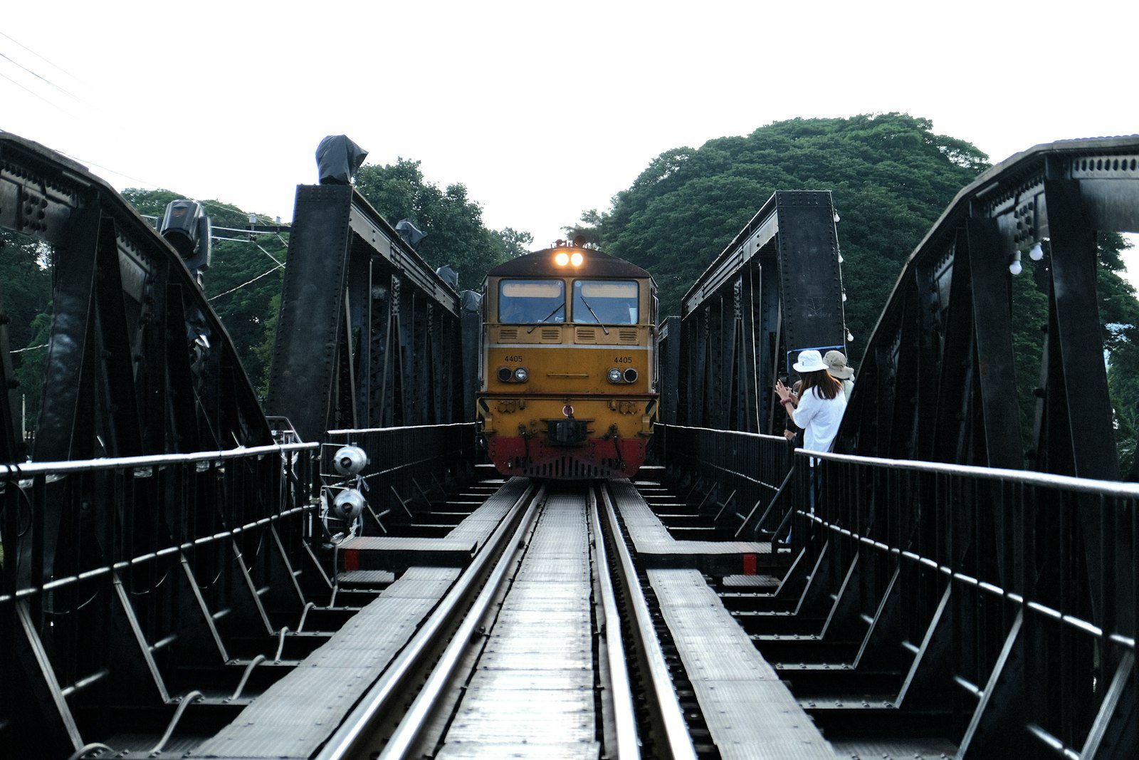Train crossing a bridge over the River Kwai in Kanchanaburi, Thailand