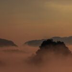 Misty mountain layers at sunrise in Northern Thailand